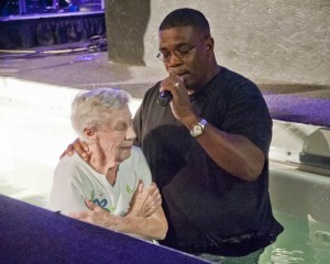 Pastor Ricardo Johnson stands in the baptismal font at Church on the Rise in Westlake.