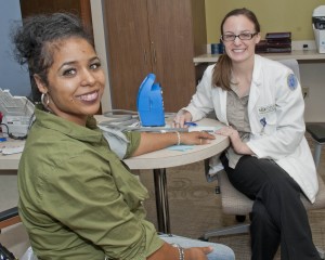 Health screenings like blood pressure offered wellness information for guests