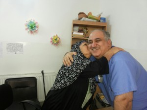 Dr. Sayed accepts gratitude from a Syrian refugee.