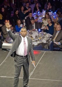 Former Ohio State great and NFL Hall of Famer Cris Carter greets the crowd.