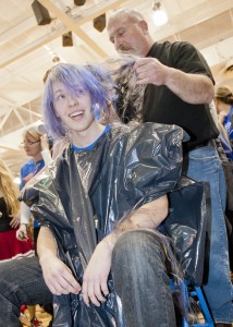 Student Tim Garner goes under the blade for St. Baldrick’s Day.