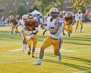 Avon tight end Chris Maxwell hauls one in for a long gainer against Avon Lake