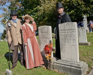 Jim Potter dressed as Bay Village settler Olaf Aslaksen, Kaycee Zack outfitted as Sarah Osborn and Nathan Clark as her escort, greeted visitors to Bay Village’s historic Lakeside Cemetery.
