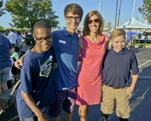 YC participant Chris Hardin, Nick Morris, Lisa and Gabe Puthoff at the Youth Challenge Regatta