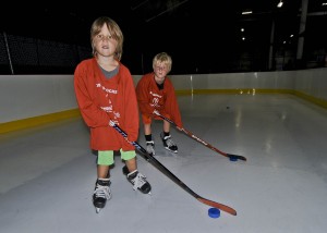 Brothers Evan and Cole Duncan on the synthetic ice.