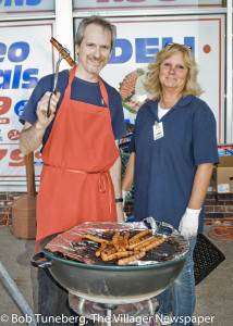 Jim Norris, Manager, with Lou Ann Giusti at the grill.