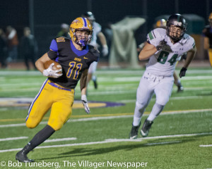 Jason Santora (11) looks for yardage.