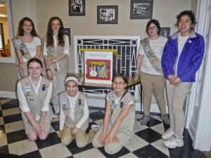 CadetteTroop 71345 with one of the 2 Little Free Libraries they built.