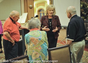Mayor Bobst speaks with Normandy residents after her 2016 State of the City address.