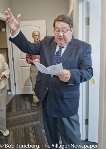 Community West Foundation Board Member Rev. David Buegler joins with the Community West Foundation family in blessing the new office.