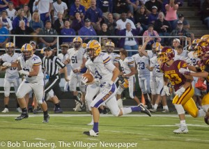 Avon High Senior Mitch Cooper gains big ground in the Eagles win over Avon Lake.