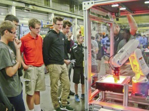 Watching a Denso Robot in operation.