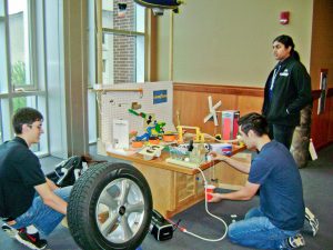 Rube Goldberg 2017 - David Eppele Mark Sargent Sneha Ramachandran setting up machine-1